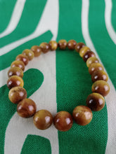Cargar imagen en el visor de la galería, Pulsera Ojo de Tigre Dorado 8 mm
