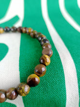 Cargar imagen en el visor de la galería, Pulsera Ojo de Tigre 6 mm Facetada
