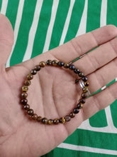 Cargar imagen en el visor de la galería, Pulsera Ojo de Tigre 6 mm Facetada
