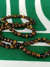 Cargar imagen en el visor de la galería, Collar Ojo de Tigre 54 cm de 6 mm
