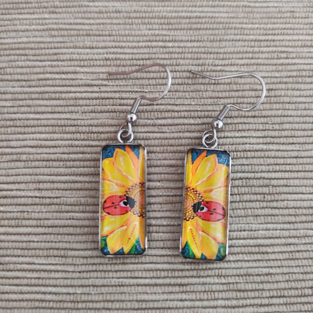 Pendientes Glass & Steel Girasol Mariquitas